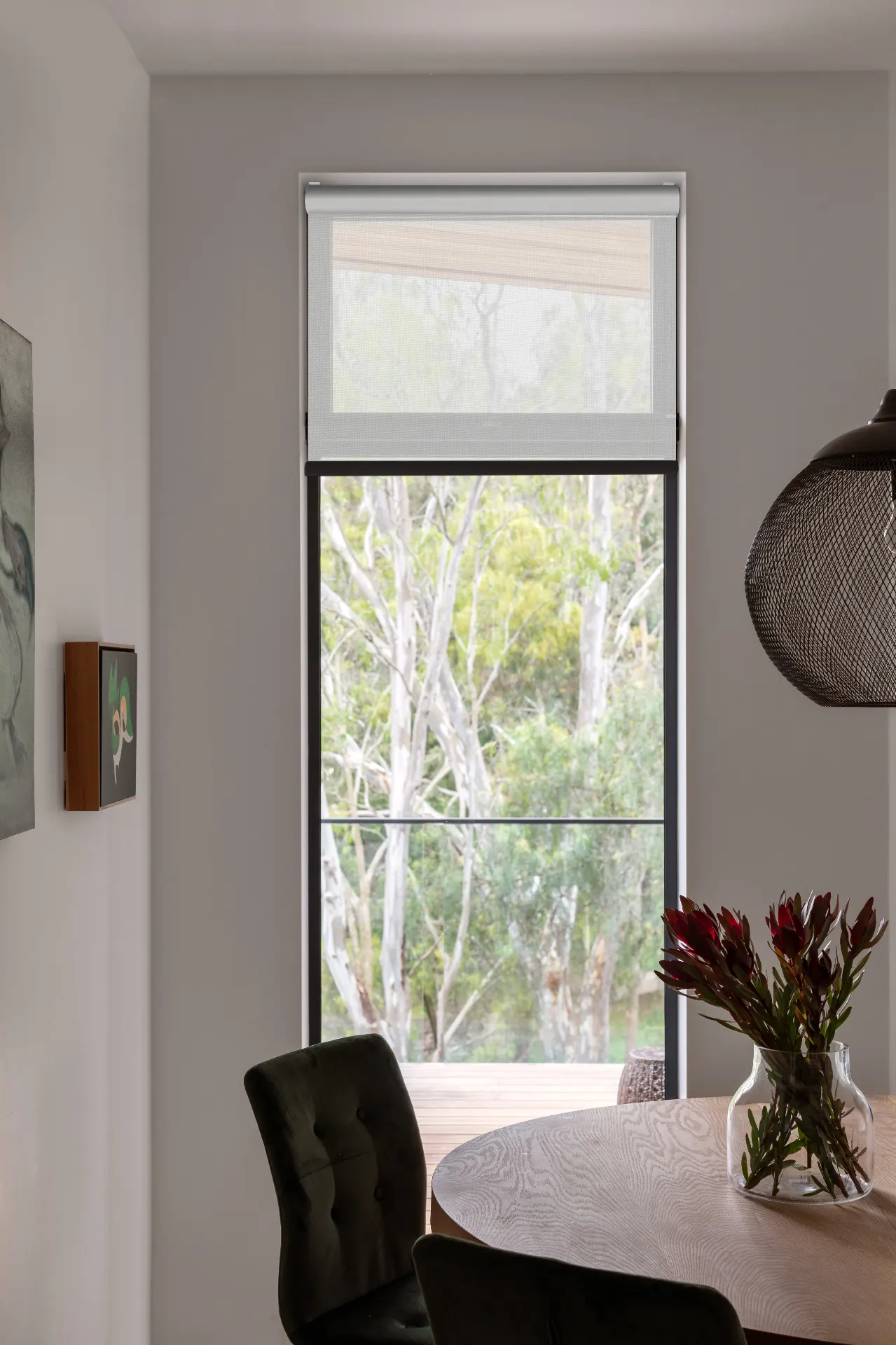 Sunscreen roller blind in a modern dining room