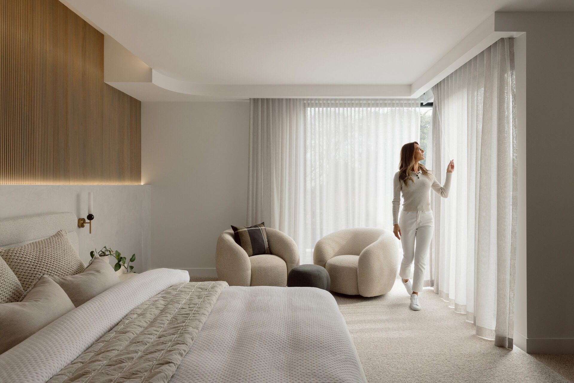 Energy efficient sheer curtains and roller blinds in a Berwick home