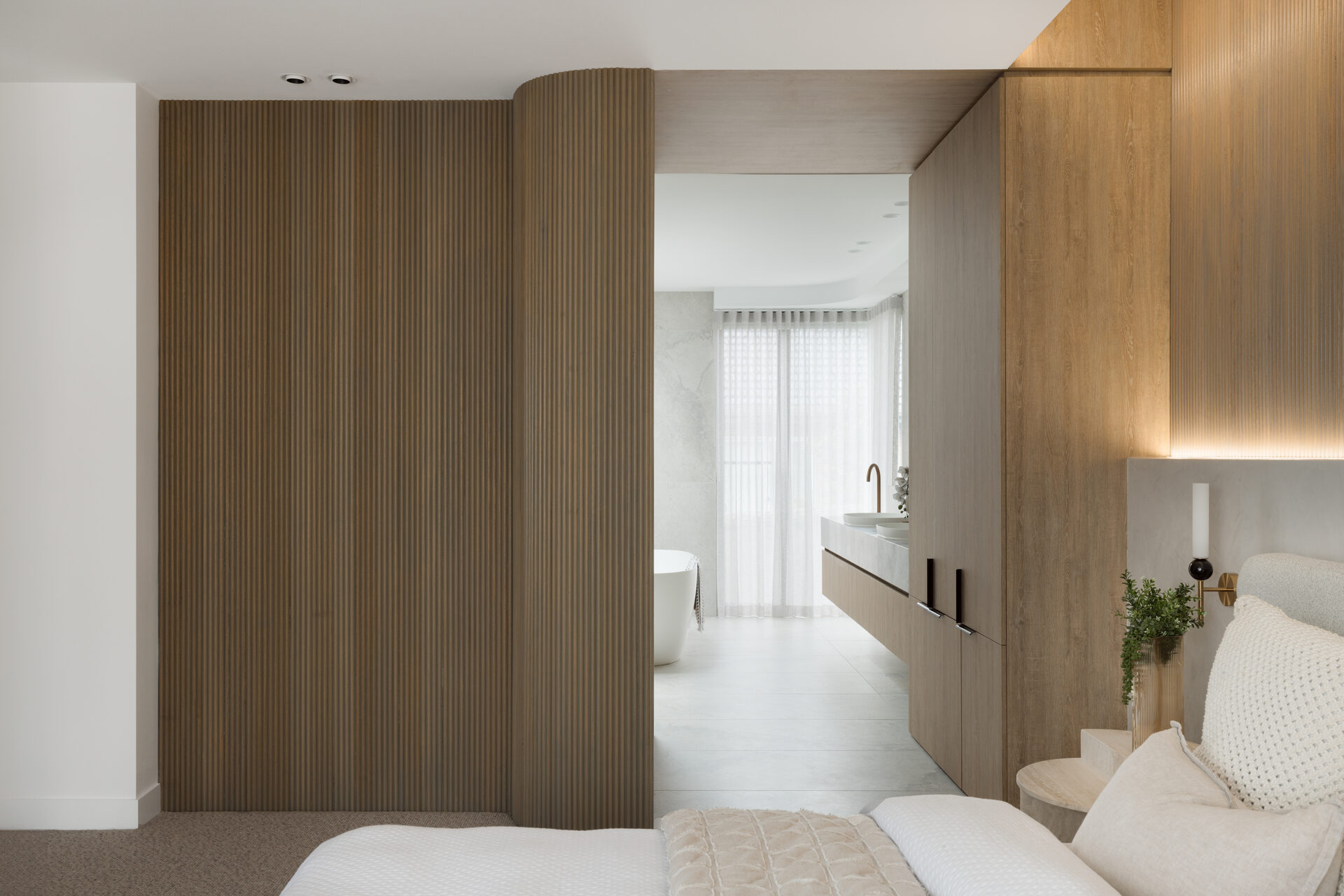 Spa-like bathroom with layered window treatments β Berwick