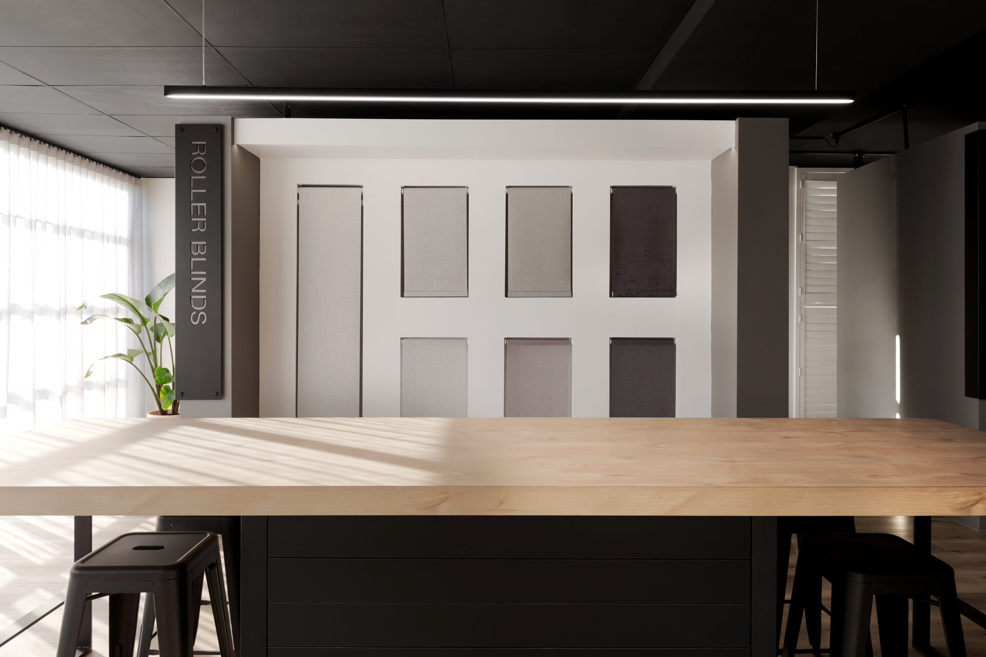 Tip Top Blinds showroom layered window treatments
