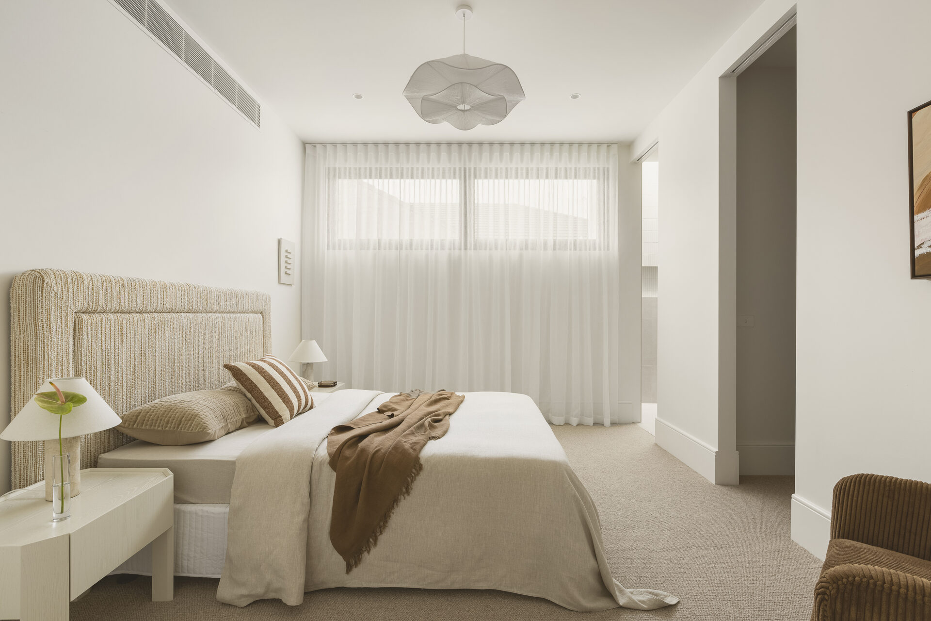 Layered sheer curtains and roller blinds at 13a Telford project