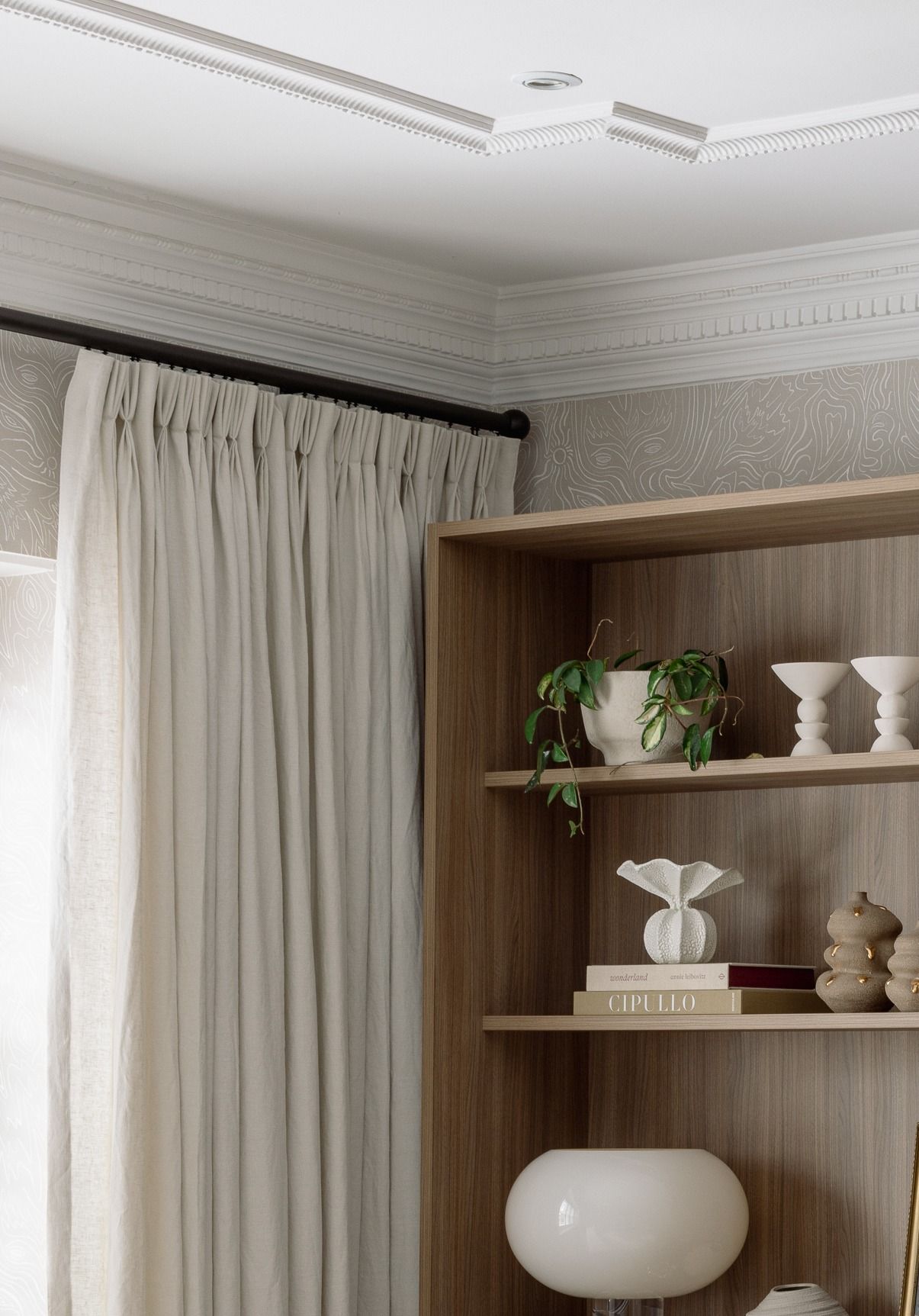 Layered shutters and tailored curtains in a Malvern formal living room