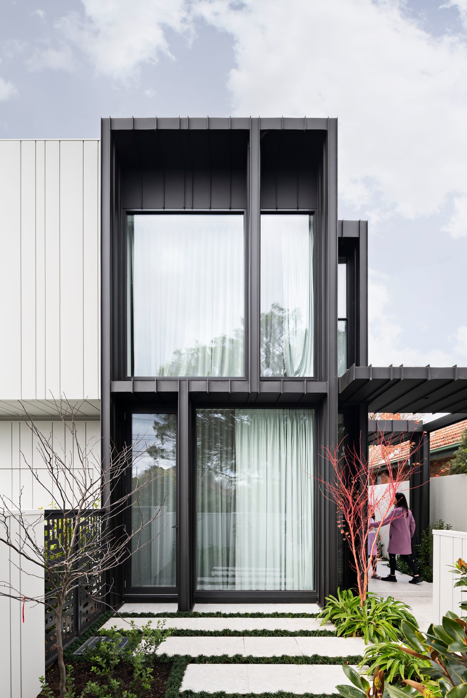 Luxurious full-width blockout curtains in a Melbourne home