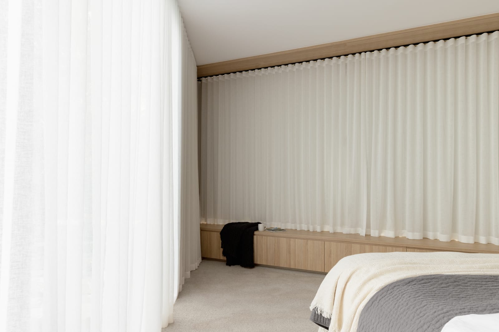 Double curtain setup with sheer curtain in front and blockout curtain behind in a Mount Eliza home