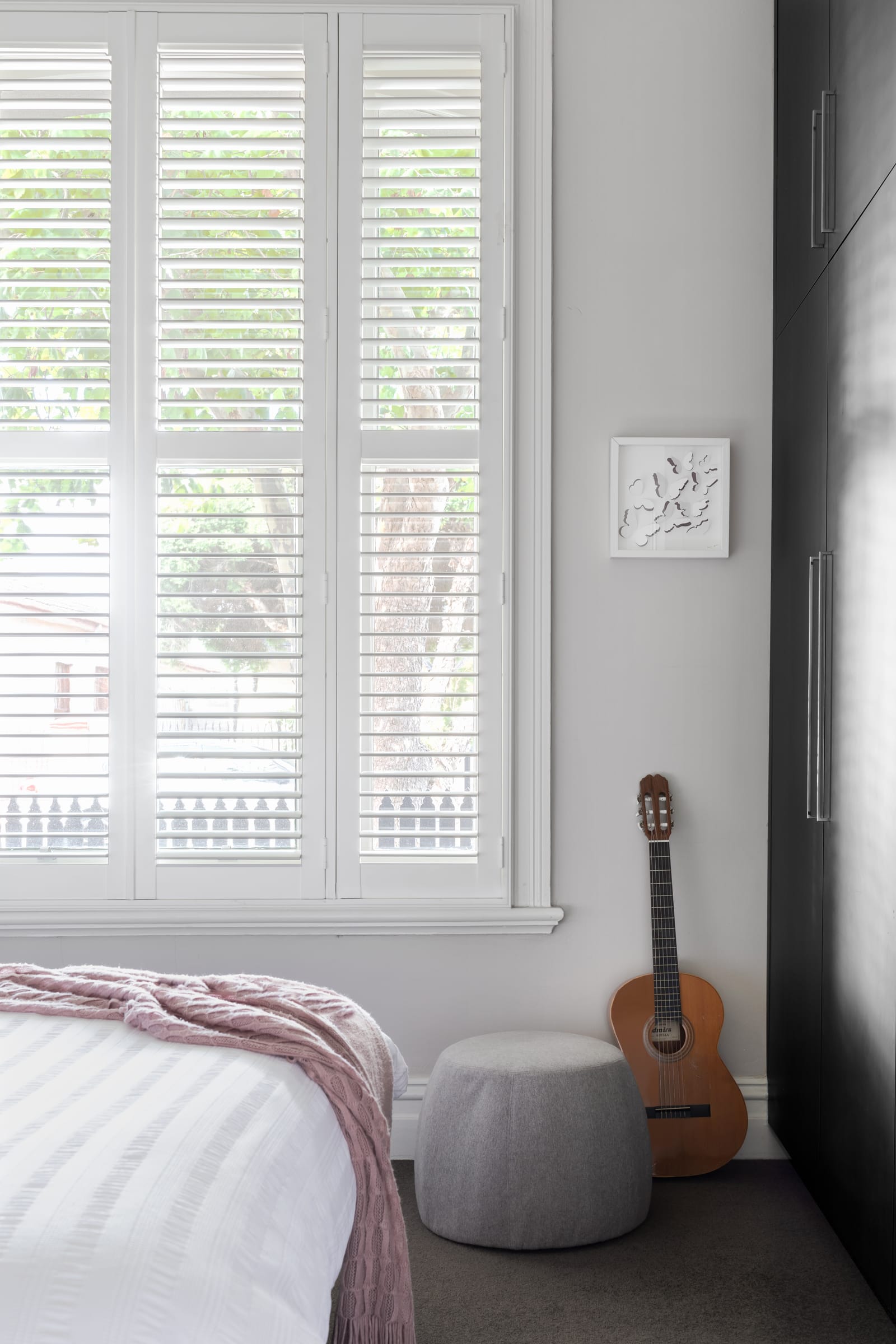 Plantation shutters on a window in a Regent Street Melbourne home
