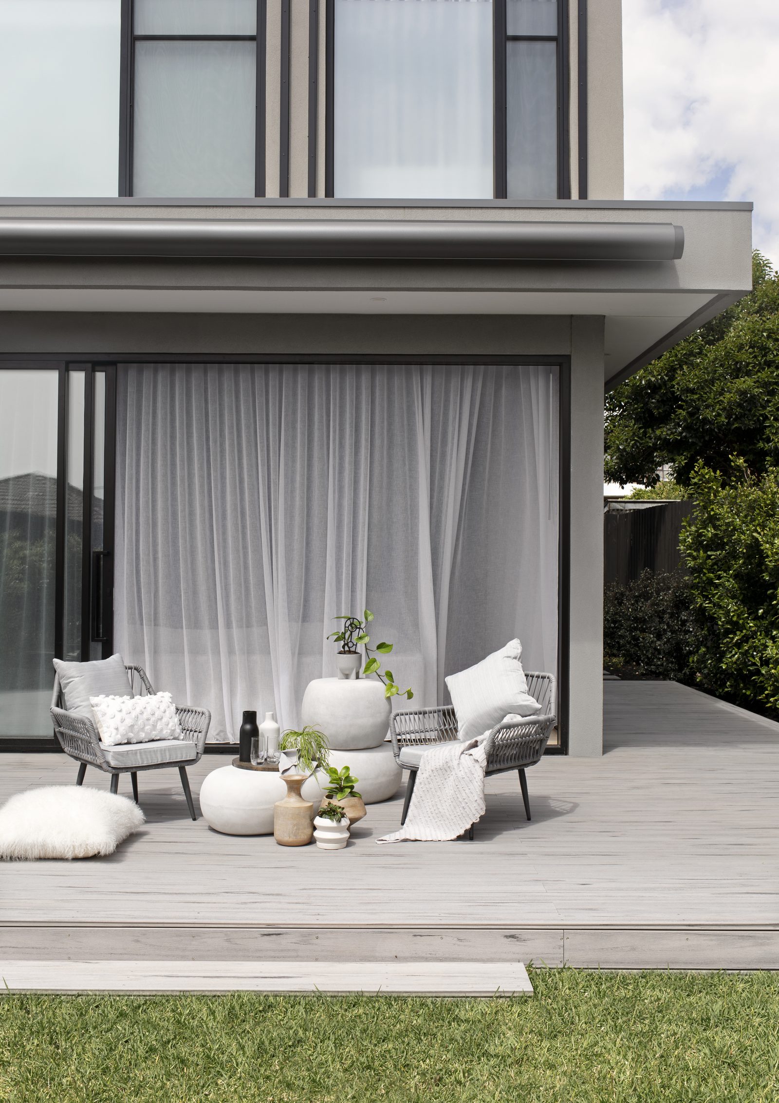 Folding arm awning shading an alfresco area at a Melbourne home