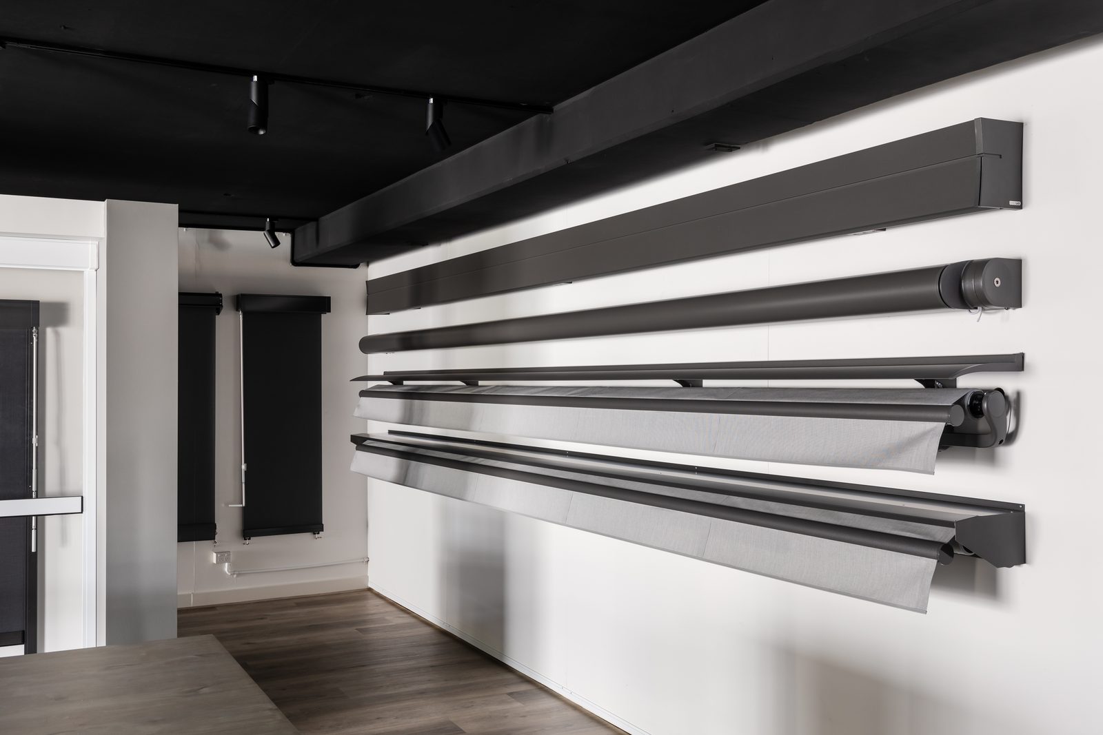 Folding arm awnings on display at the Tiptop Blinds Clayton showroom