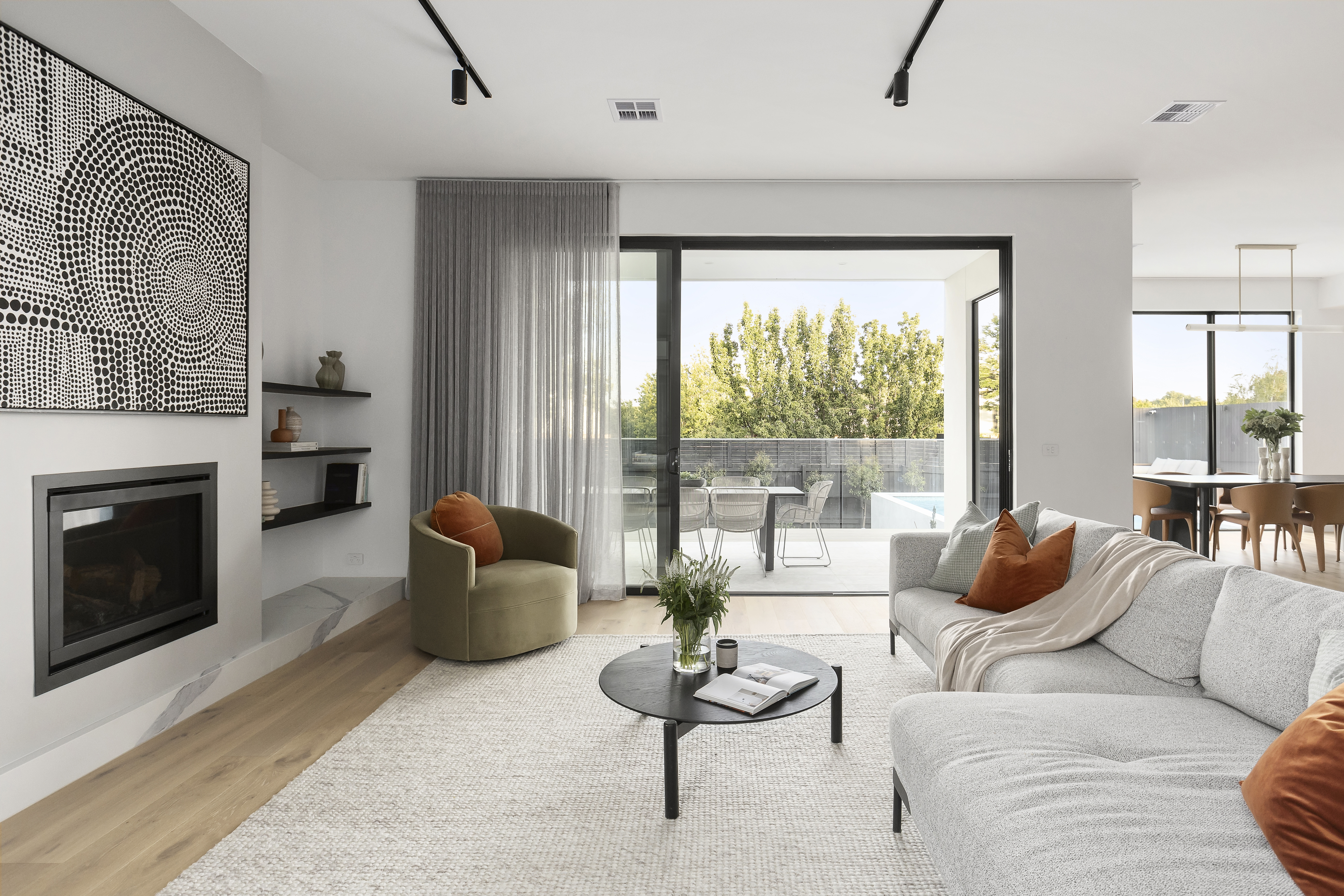 Glen Iris — open-plan living with wall-to-wall sheer curtains