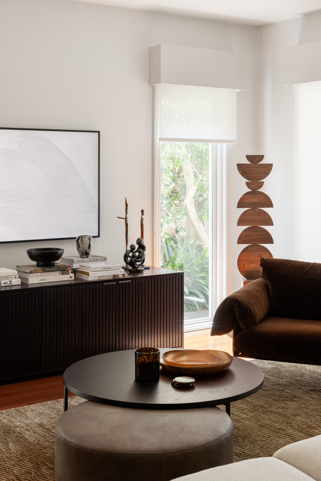 Hawthorn East — family room with sleek roller blinds and bonded pelmets